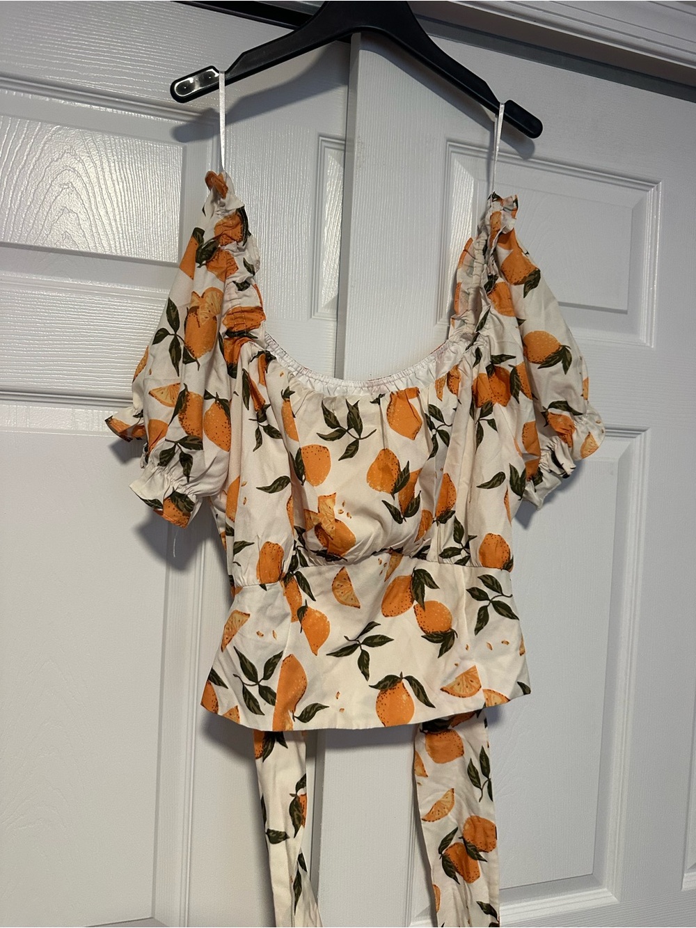 Cider Orange Print Puff Sleeve Peplum Blouse